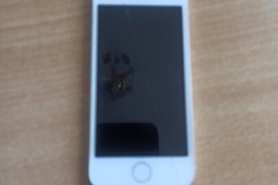 Конфісковане майно: мобільний телефон марки "IPhone" модель S5 в корпусі біло-рожевого кольору, б/в