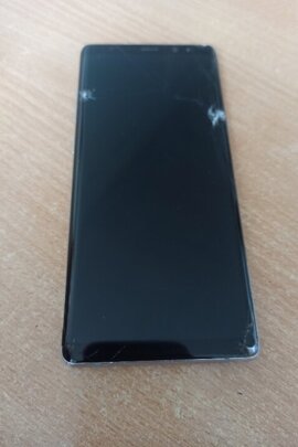 Конфіскація майна: мобільний телефон марки "SAMSUNG,моделі «SM-N950F/DS» сірого кольору, б/в