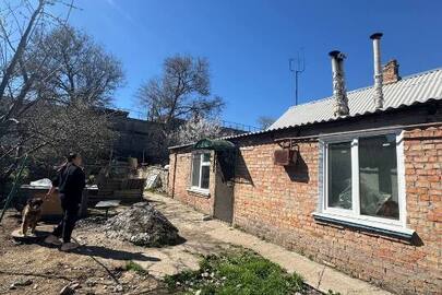 1/4 частина житлового будинку, загальною площею - 73,0 (кв.м), що розташований за адресою: м. Запоріжжя, Комунарський р., вул. Балка Попівка, б. 204, реєстраційний номер майна 13042822