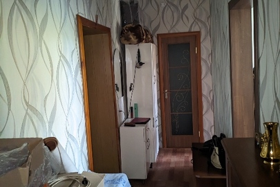 1/2 частина трикімнатної квартири, загальною площею 61,7 кв.м, за адресою: Кіровоградська обл., Олександрійський р-н, м. Світловодськ, сел. Власівка, вул. Молодіжна, 13, кв. 11