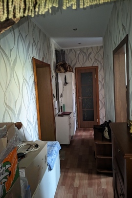 1/2 частина трикімнатної квартири, загальною площею 61,7 кв.м, за адресою: Кіровоградська обл., Олександрійський р-н, м. Світловодськ, сел. Власівка, вул. Молодіжна, 13, кв. 11