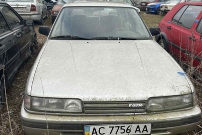 Конфісковане майно за рішенням суду: транспортний засіб марки Mazda, модель 626, н/д року випуску, тип транспортного засобу: легковий, колір сірий, номер кузова: JMZGD12D201347265, номер державної реєстрації: АС7756АА