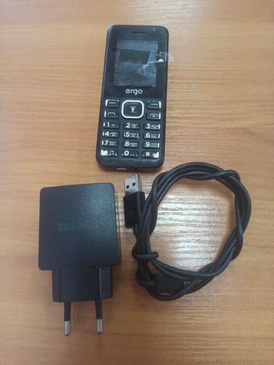 Мобільний телефон марки «ERGO б/в, 1 шт., зарядний пристрій «MEIZU» до мобільного телефону б/в, 1 шт. та сім-картку мобільного оператора «Київстар» б/в, 1 шт.