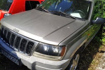 Легковий автомобіль марки «Jeep», модель «Grand Cherokee», реєстраційний номерний знак FZA12203, 2002 р.в., кузов № 1J8GWE8212Y115266, сірого кольору