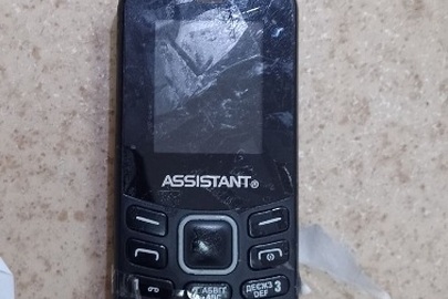 Мобільний телефон "Assіstant",чорного кольору,бувший у користуванні