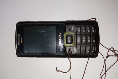 Мобільний телефон " Samsung " чорного кольору,бувший у користуванні