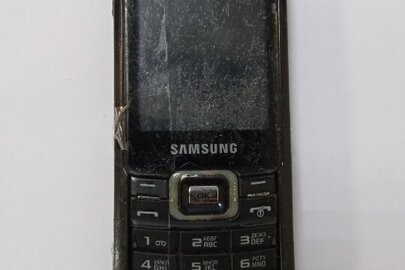 Мобільний телефон " Samsung" чорного кольору,бувший у використанні