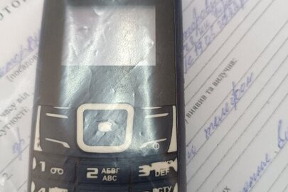 Конфісковане майно за ухвалою суду:мобільний телефон "Nomi", бувший у користуванні