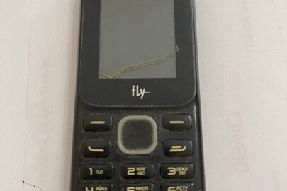 Мобільний телефон 1 шт. марки "Fly", ІМЕІ - відсутній, стан б/в