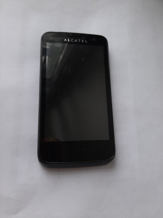 Мобільний телефон «Alcatel one touch 5020D» чорного кольору, 1 од., б/в