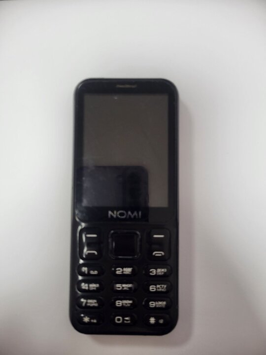 Мобільний телефон NOMI,б/в