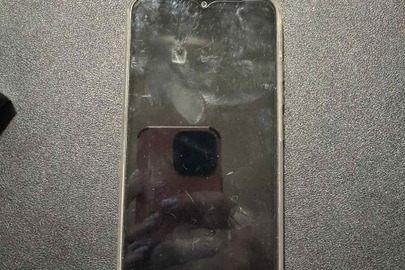 Конфіскація майна за рішенням суду: мобільний телефон марки "REDMI", б/в