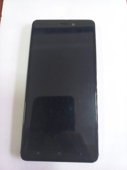 Мобільний телефон марки Xiaomi Redmi 4, сріблястого кольору, з сімкартою, б/в