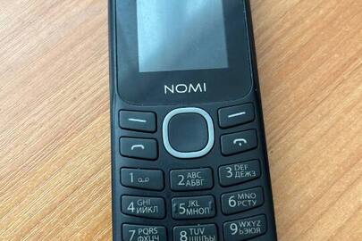 Мобільний телефон марки Nomi, б/в