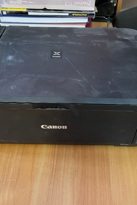 Конфісковане майно за рішенням суду: принтер марки "Canon" моделі "K10380", чорного кольору, бувший у використанні