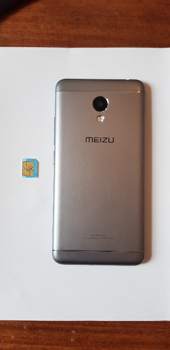Мобільний телефон MEIZU, сірого кольору,  з пакетом мобільного зв