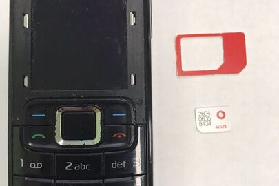 Мобільний телефон "Нокіа" та сім-карта мобільного оператора "Водафон"