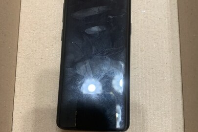 Мобільний телефон чорного кольору марки " Samsung Galaxy S9" ІМEI 3569 1509 1887 850 б/в
