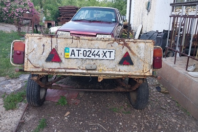 Причіп КРАЗ 8138, 1990 року випуску, сірого кольору, реєстраційний номер АТ0244ХТ, VIN XJC0081380002189