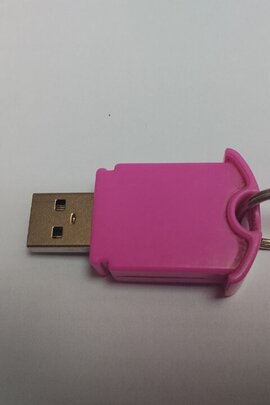 Конфіскація майна за рішенням суду: USB носій, б/в