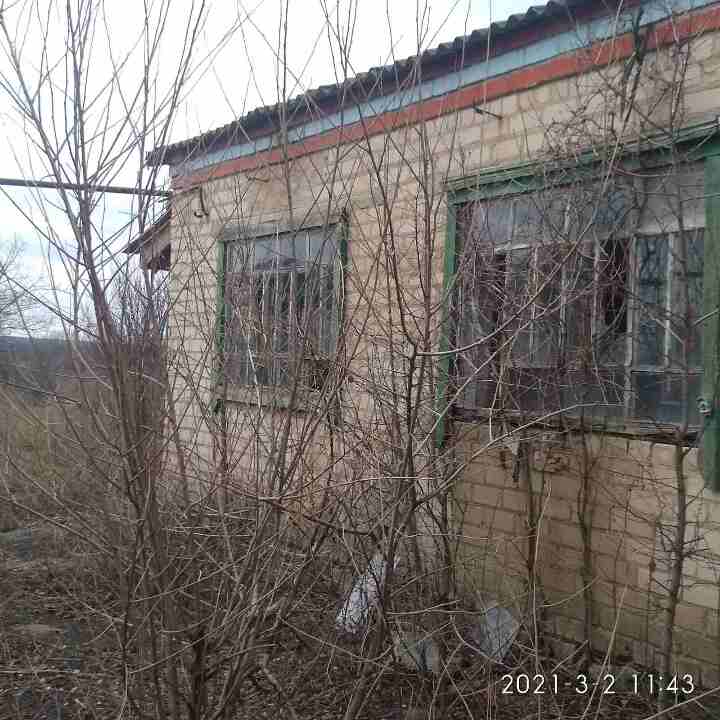 Домоволодіння. Житловий будинок загальною площею 53,8 кв.м. за адресою: Дніпропетровська область, с. Комісарівка, вул. Сонячна (колишня назва Карла Маркса), 95