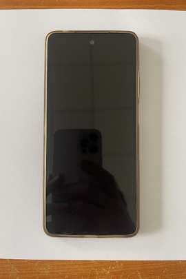 Конфісковане майно: мобільний телефон марки "Motorola" моделі  "moto g04", IMEI 355051482359771/18, бувший у використанні, в кількості 1 шт.