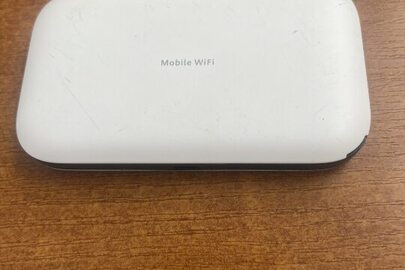 Конфісковане майно за рішенням суду: Wi-Fi роутера " Mobile", бувший у використанні, білого кольору, робочий стан не перевірявся