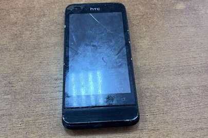 Конфісковане майно за рішенням суду: мобільний телефон «НТС» , бувший у використанні, чорного кольору, робочий стан не перевірявся