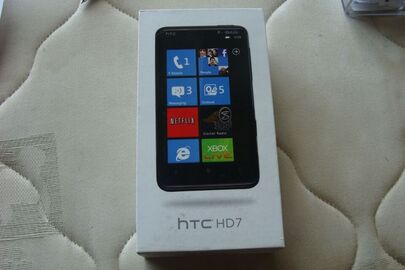 Мобільний телефон HTC, модель HD 7, с.н.HTOCRR07669. Країна виробництва та виробник невідомий та бездротова клавіатура «НР» Країна виробництва та виробник невідомий 