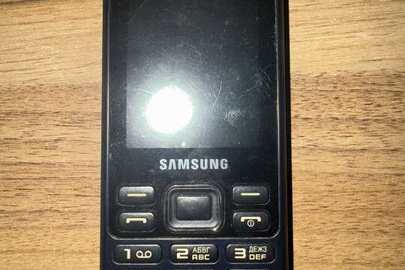 Конфісковане майно за рішенням суду, мобільний телефон марки  «Samsung» ІМЕ1-1: 352504/08/696893/5, IMEI-2: 352505/08/696893/2, б/в