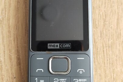 Мобільний телефон марки "Max com" моделі "ММ142",  в середині якого сім-карта оператора мобільного зв'язку "Київстар" , стан (б/в)