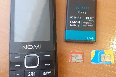 Мобільний телефон марки "NOMI" модель і2402 та дві сім карти мобільних операторів: "Київстар" та "Водафон" бувші у використанні