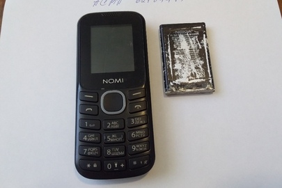 Мобільний телефон марки "Nomi" IMEI:353035088627376 та акумуляторна батарея до нього, б/в