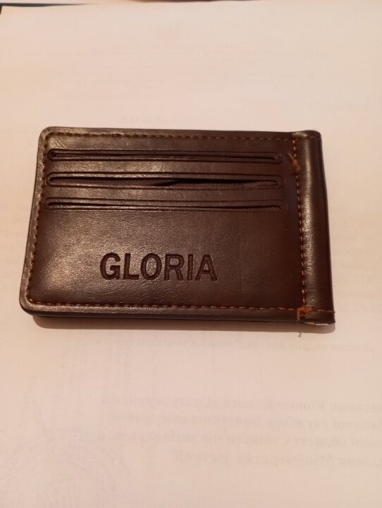 Гаманець коричневого кольору з надписом «Gloria» у вигляді книжечки, б/в