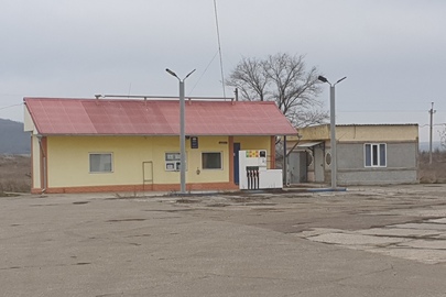 Будівля АЗС і КАФЕ-БАР, загальною площею 63.2 кв.м, за адресою: Одеська обл., Роздільнянський (у минулому Великомихайлівський) район, с. Новопетрівка, вулиця Леніна (нині Центральна), 1-б, РНОНМ 570401851216