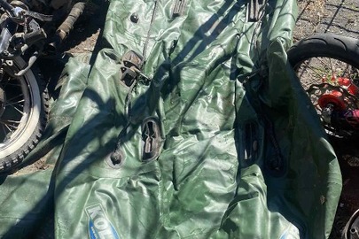 Конфісковане майно за рішенням суду: Гумовий надувний човен зеленого кольору марки «KOLIBRI», два дерев’яні весла, була у використанні