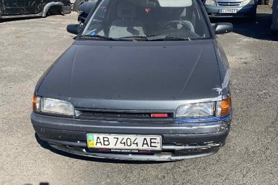 Легковий автомобіль MAZDA, моделі 323 1.6 I, реєстраційний номер АВ7404АЕ,VIN  JMZBG13E200224308, сірого кольору, 1990 р.в.