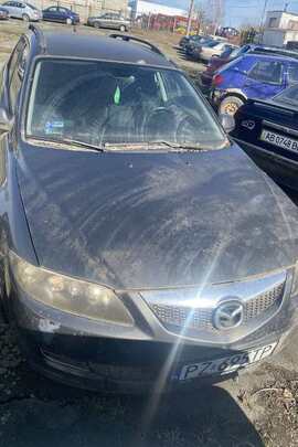 Легковий автомобіль марки MAZDA 6, реєстраційний номер PZ695TP, сірого кольору, 2005 року виробництва, кузов № JMZGY19T661418101
