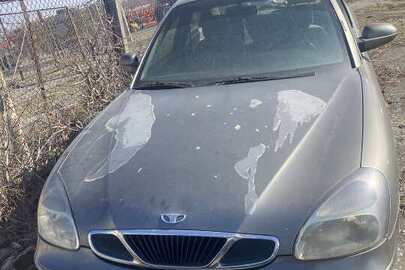 Легковий автомобіль марки DAEWOO NUBIRA, реєстраційний номер RPR19002, коричневого кольору, 1999 року виробництва, кузов № KLAJF696EYK386554