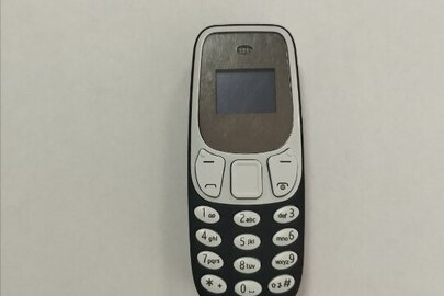 Конфіскація майна за рішенням суду: мобільний телефон  марки "Mini Phone" б/в