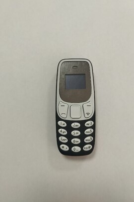 Конфіскація майна за рішенням суду: мобільний телефон  марки "Mini Phone" б/в