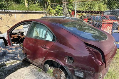 Кузов до легкового автомобіля марки «Nissan», модель «Primera», номер кузова SJNFFAP12U01254180, номерний знак Словаччини МІ779ЕG, колір - червоний