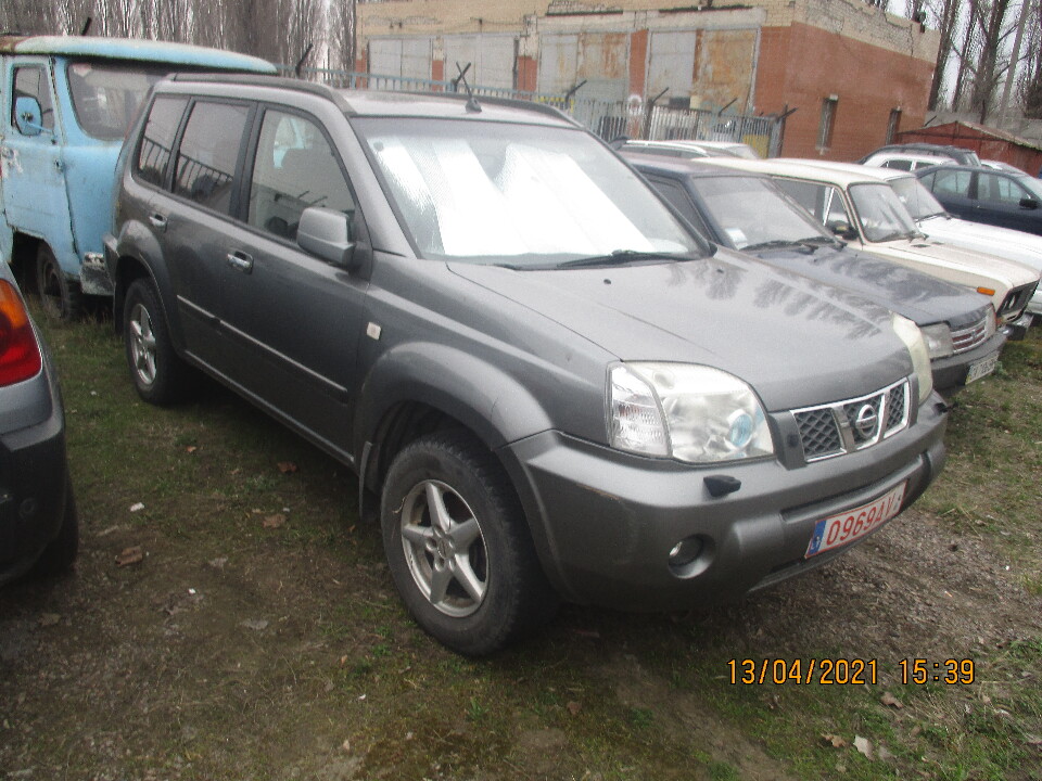 Легковий автомобіль NISSAN X-TRAIL, тимчасовий реєстраційний номер 0969AV, 2006 року випуску, сірого кольору, номер кузову JN1TBNT30U0126998