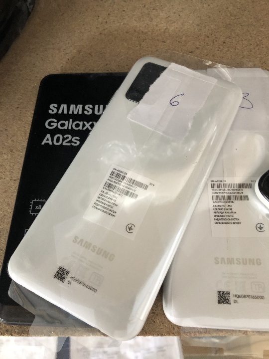 Мобільні телефони торгівельної марки «Samsung», моделі «Galaxy A02S», без ознак використання, без упаковки виробника, білого кольору, країна виробництва - Китай, 15 шт.