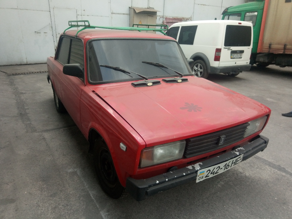 Легковий автомобіль ВАЗ 2105, державний номер 24216НЕ, 1981 року випуску, червоного кольору, кузов № ХТА210500В0033146