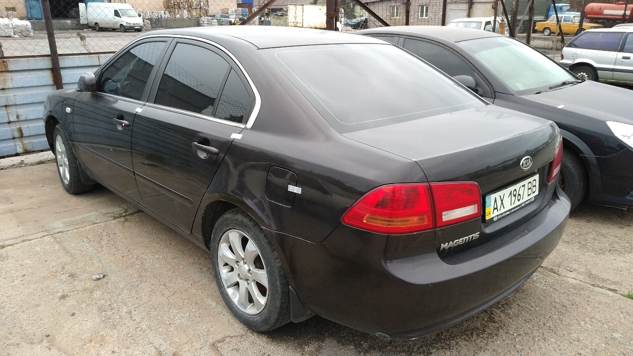 Легковий автомобіль KIA MAGENTIS, державний номер АХ1967ВВ, 2007 року випуску, коричневого кольору, кузов №KNEGE222275147406