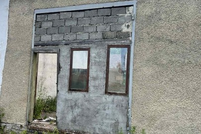 1/2 частина гаражних боксів заг. пл. (кв.м): 255,6, за адресою: Івано-Франківська обл., Косівський р., с. Смодна, вулиця Незалежності, 50