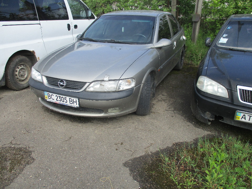 Транспортний засіб марки Opel Vectra 1.8, 1996 року випуску, сірого кольору, №куз. W0L000038T7520243, №двигуна X18XEV1753286, днз ВС2305ВН