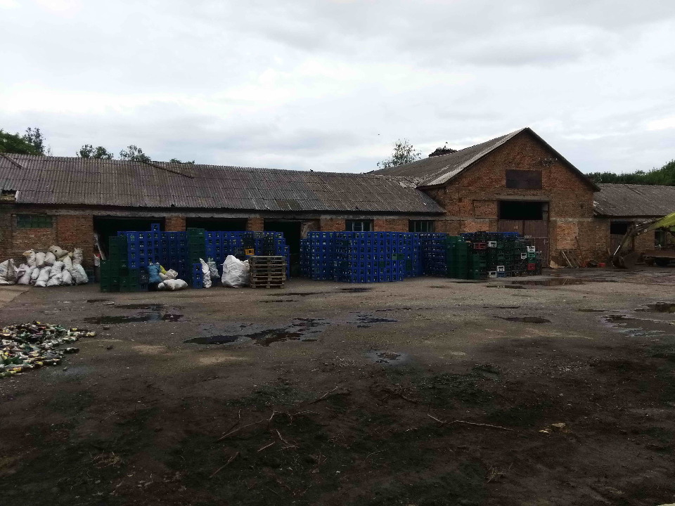 1/2 частка нежитлової будівлі літ. А-1 (будівля тракторної майстерні), загальною площею 854.1 кв.м., за адресою: Львівська область, Сокальський район, с. Опільсько, вул. Зелена, 52