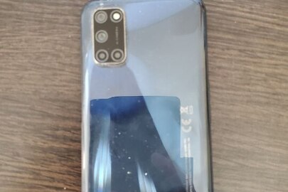 Конфісковане майно за рішенням суду: мобільний телефон "OPPO A52", темного синього кольору, б/в